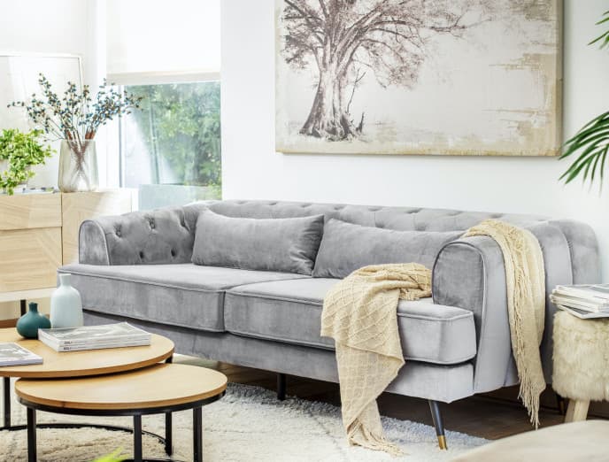 Cómo decorar con cuadros y canvas la pared de tu sofá