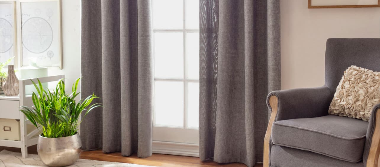 10 estilos de cortinas para un living moderno