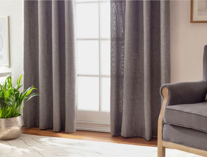 10 estilos de cortinas para un living moderno