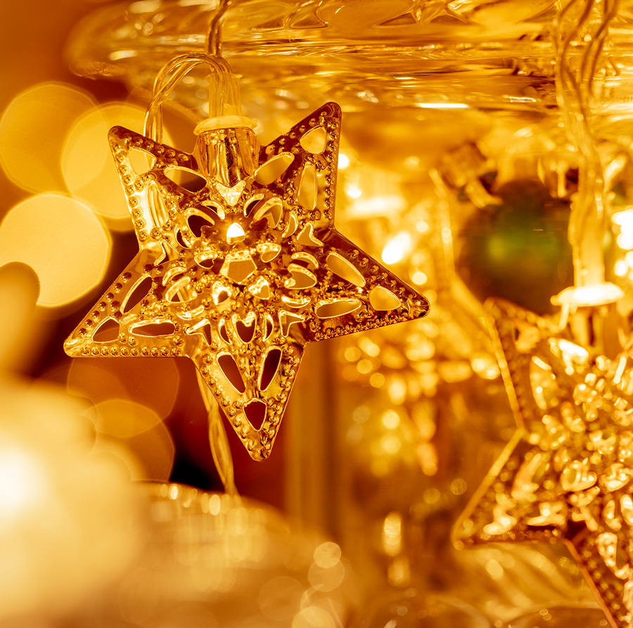 Luces navideñas con forma de estrella dorada